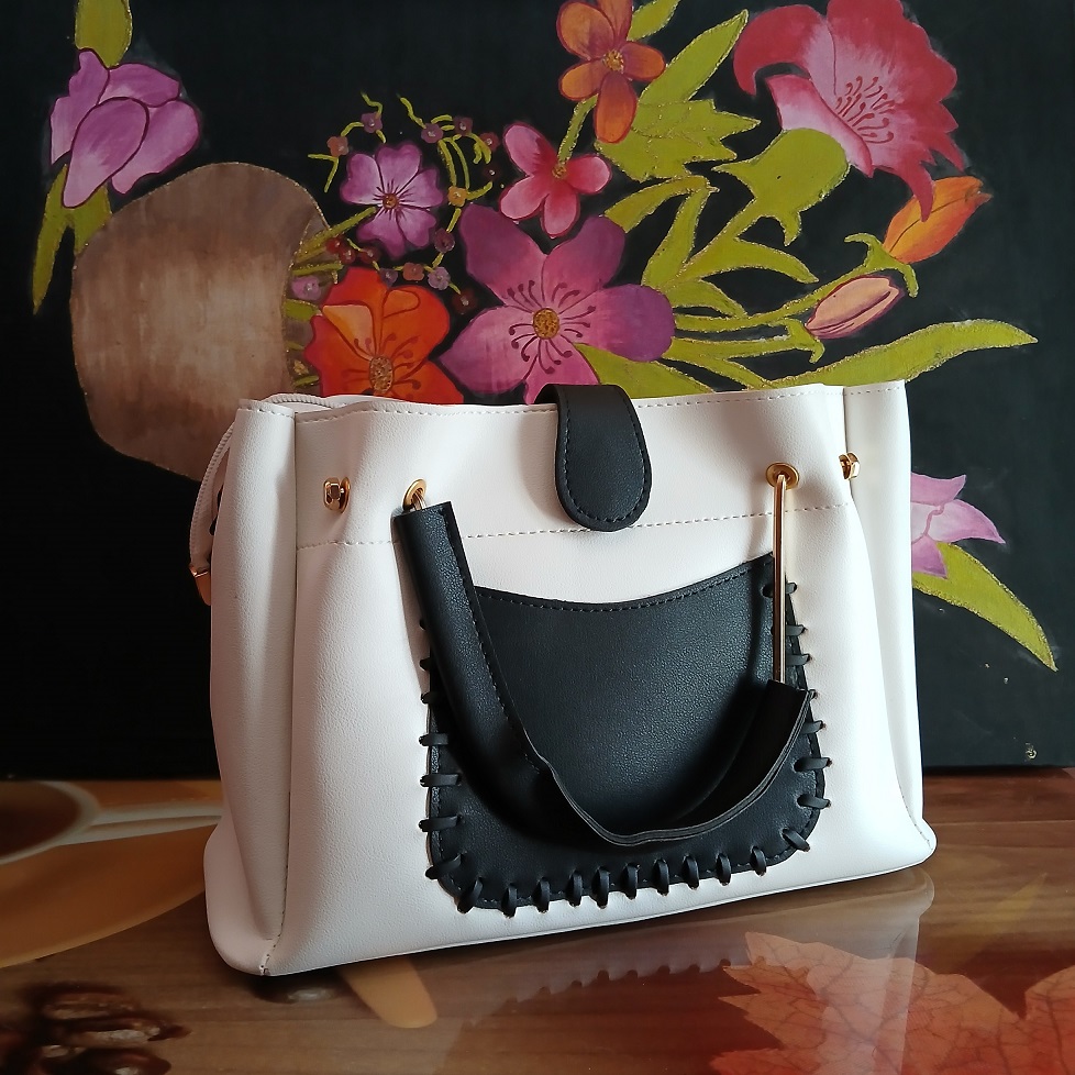 white and black bag